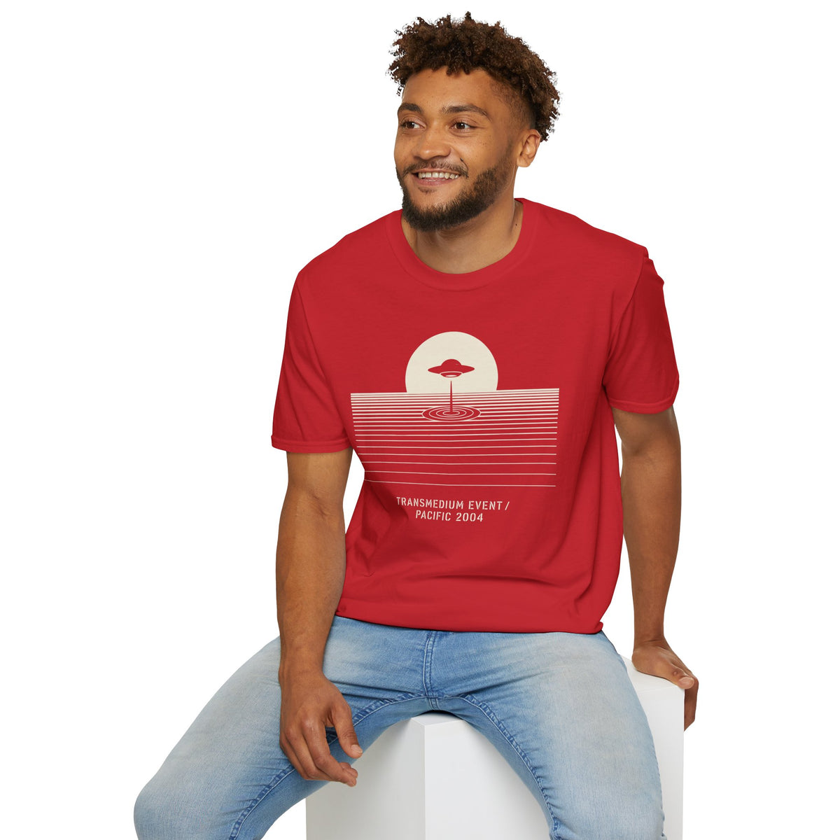 T-shirt with UFO above rippling ocean horizon lines and Transmedium Event Pacific 2004 caption, red