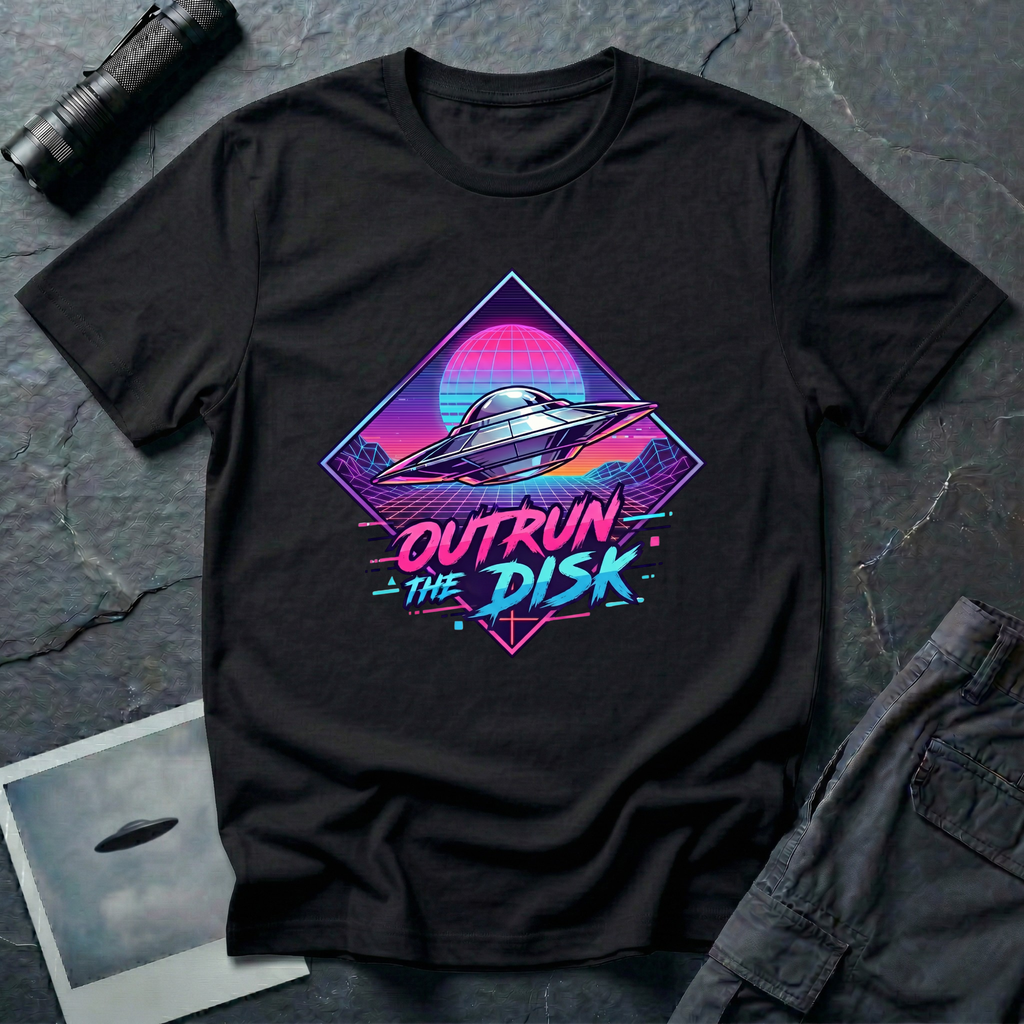 Outrun The Disk synthwave UFO t-shirt — chrome saucer across neon grid landscape with wireframe sun and retrowave typography on black cotton tee