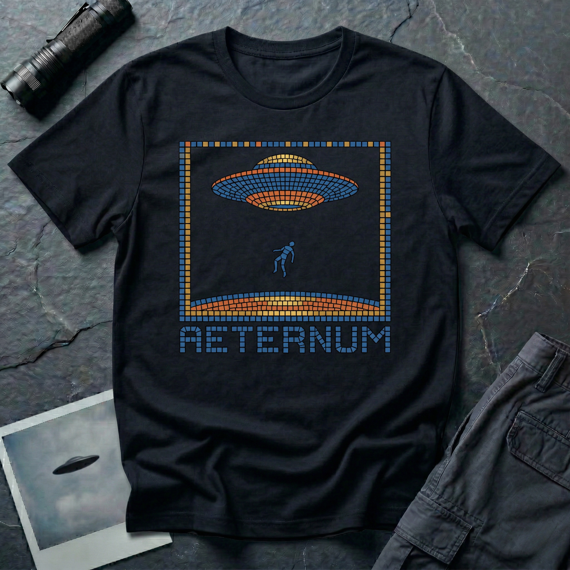 Aeternum Roman mosaic UFO t-shirt — flying saucer and abduction scene in blue and terracotta tile mosaic style on black cotton tee