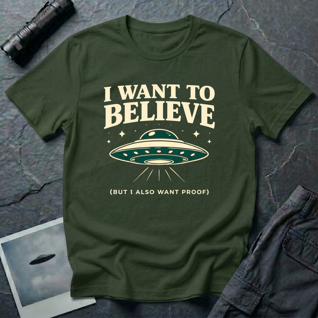 I Want To Believe ironic UFO t-shirt — classic teal saucer with the phrase "I want to believe (but I also want proof)" on military green cotton tee