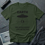 No Intelligent Life Detected UFO t-shirt — classic flying saucer above concentric scan rings and crosshairs targeting Earth with "EARTH / NO INTELLIGENT LIFE DETECTED" caption in black on green cotton tee