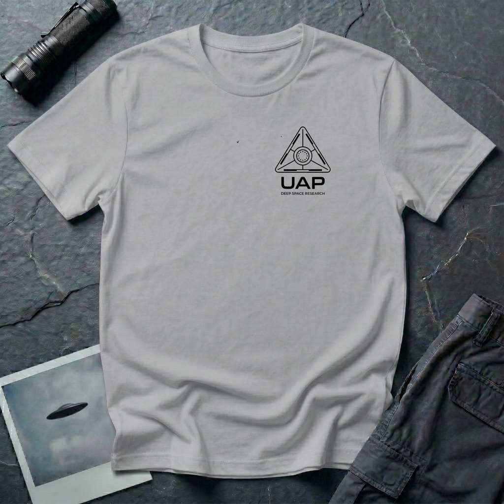 Grey t-shirt with small left-chest black line art geometric triangle UAP mission patch design with the text UAP DEEP SPACE RESEARCH
