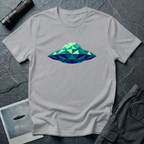 Cubist UFO geometric low poly t-shirt — classic flying saucer rendered in triangular facets of mint green, teal, and navy blue on grey cotton tee