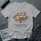 Extraterrestrial Apparatus steampunk UFO t-shirt — Victorian-era airship with exposed brass machinery gears and copper piping with "Extraterrestrial Apparatus 1888" caption on grey cotton tee