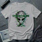 System Failure simulation UFO t-shirt — grey alien head fragmenting into pixel debris with chromatic glitch and "Error 51" on grey cotton tee