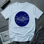 Patent Pending Roswell blueprint UFO t-shirt — navy circular cutaway diagram of flying saucer with labelled components on pale blue cotton tee