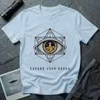 Expand Your Radar all seeing eye UFO t-shirt — sacred geometry frame around an eye containing a desert UFO encounter in gold and black linework on light blue cotton tee