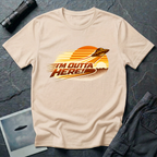 I'm Outta Here retro 80s UFO t-shirt — flying saucer speeding across striped sunset with vintage gradient type on natural unisex cotton tee