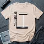 Unidentified graphic design UFO t-shirt — geometric Bauhaus-style saucer with vertical beam and "Unidentified" typography on natural cotton tee
