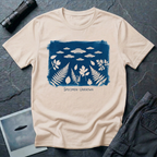 Specimen Unknown cyanotype UFO t-shirt — Anna Atkins-style cyanotype with ferns, leaves and flying saucer squadron in white on Prussian blue on natural cotton tee