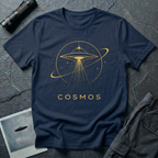 Cosmos cosmic UFO t-shirt — gold line-drawn flying saucer inside orbital planetary rings on navy unisex cotton tee
