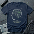 The Architecture of Belief consciousness UFO t-shirt — profile head with cutaway brain containing flying saucer and mechanical components in white and green on navy cotton tee