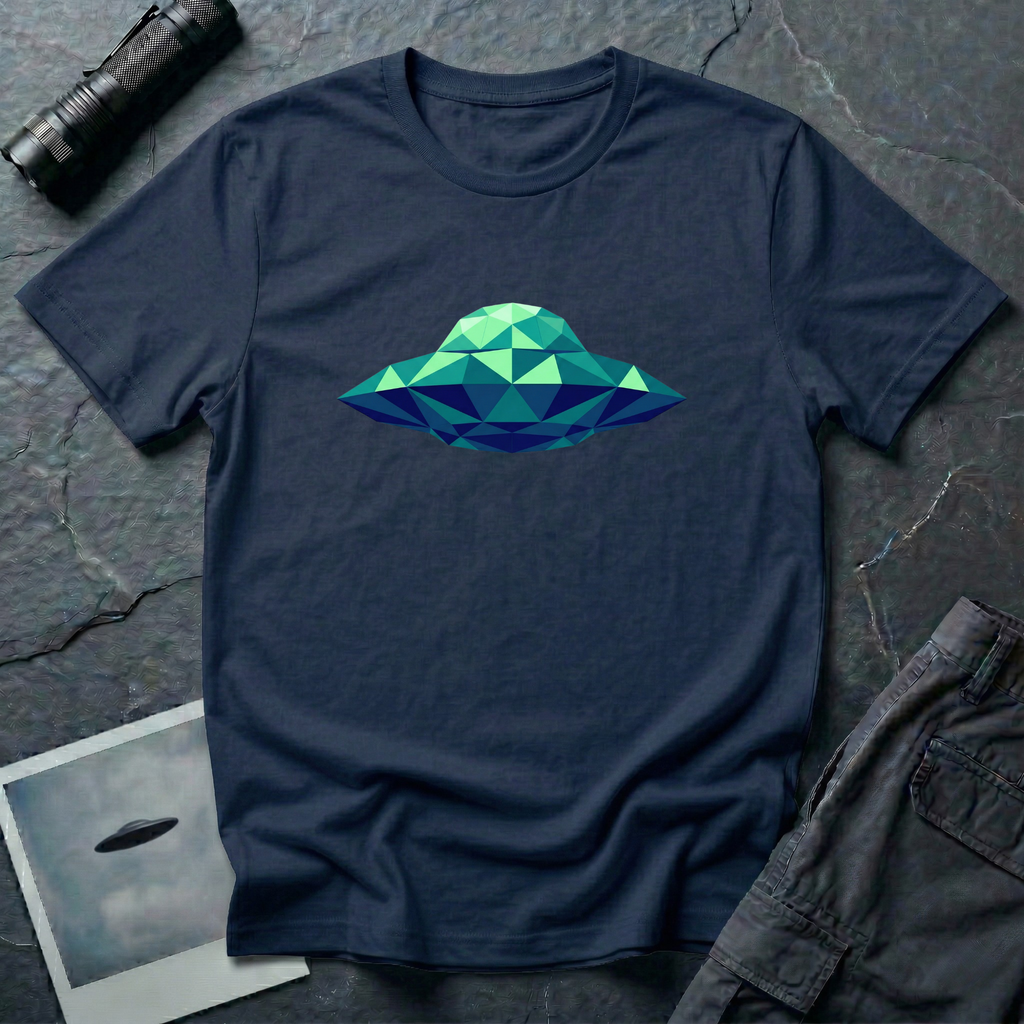Cubist UFO geometric low poly t-shirt — classic flying saucer rendered in triangular facets of mint green, teal, and navy blue on navy cotton tee