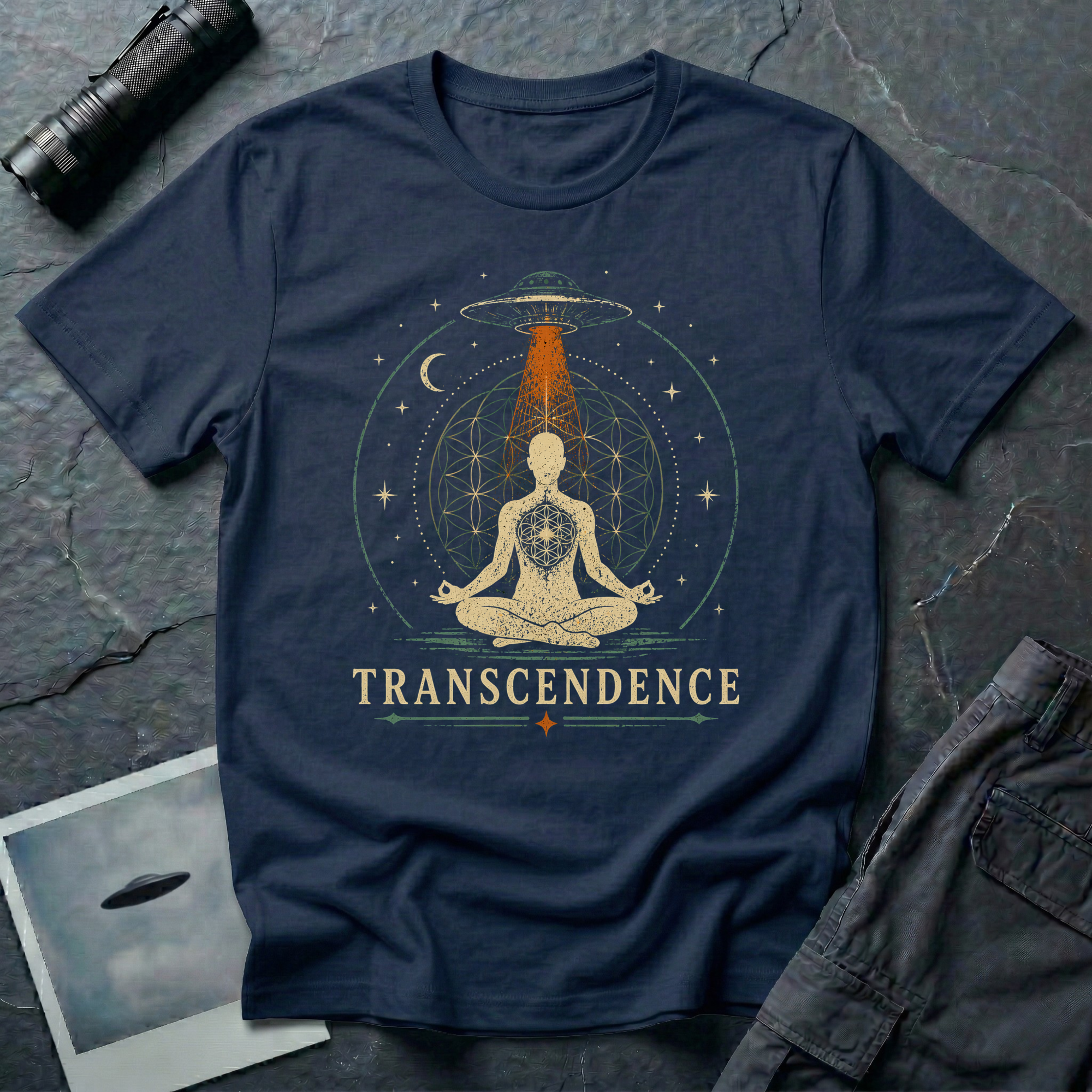 Transcendence spiritual UFO t-shirt — meditating figure with Flower of Life and flying saucer beam on navy unisex cotton tee