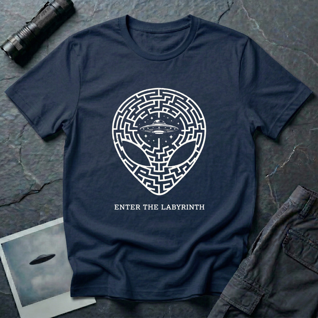 Enter The Labyrinth esoteric alien t-shirt — grey alien head filled with maze pattern and a flying saucer at the third eye in cream line-work on navy blue cotton tee