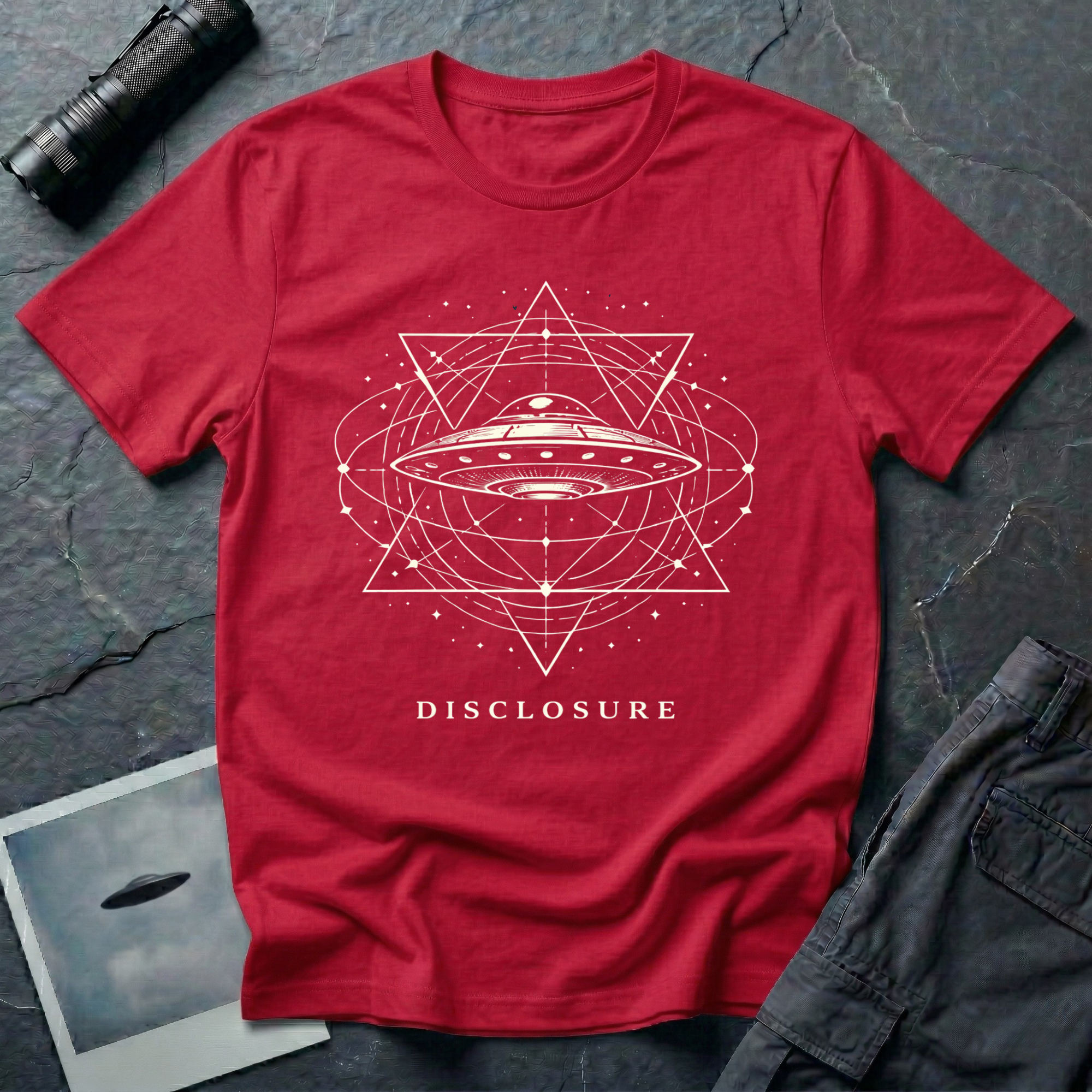 Disclosure UFO t-shirt — classic flying saucer with sacred geometry design on red unisex cotton tee