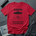 No Intelligent Life Detected UFO t-shirt — classic flying saucer above concentric scan rings and crosshairs targeting Earth with "EARTH / NO INTELLIGENT LIFE DETECTED" caption in black on red cotton tee