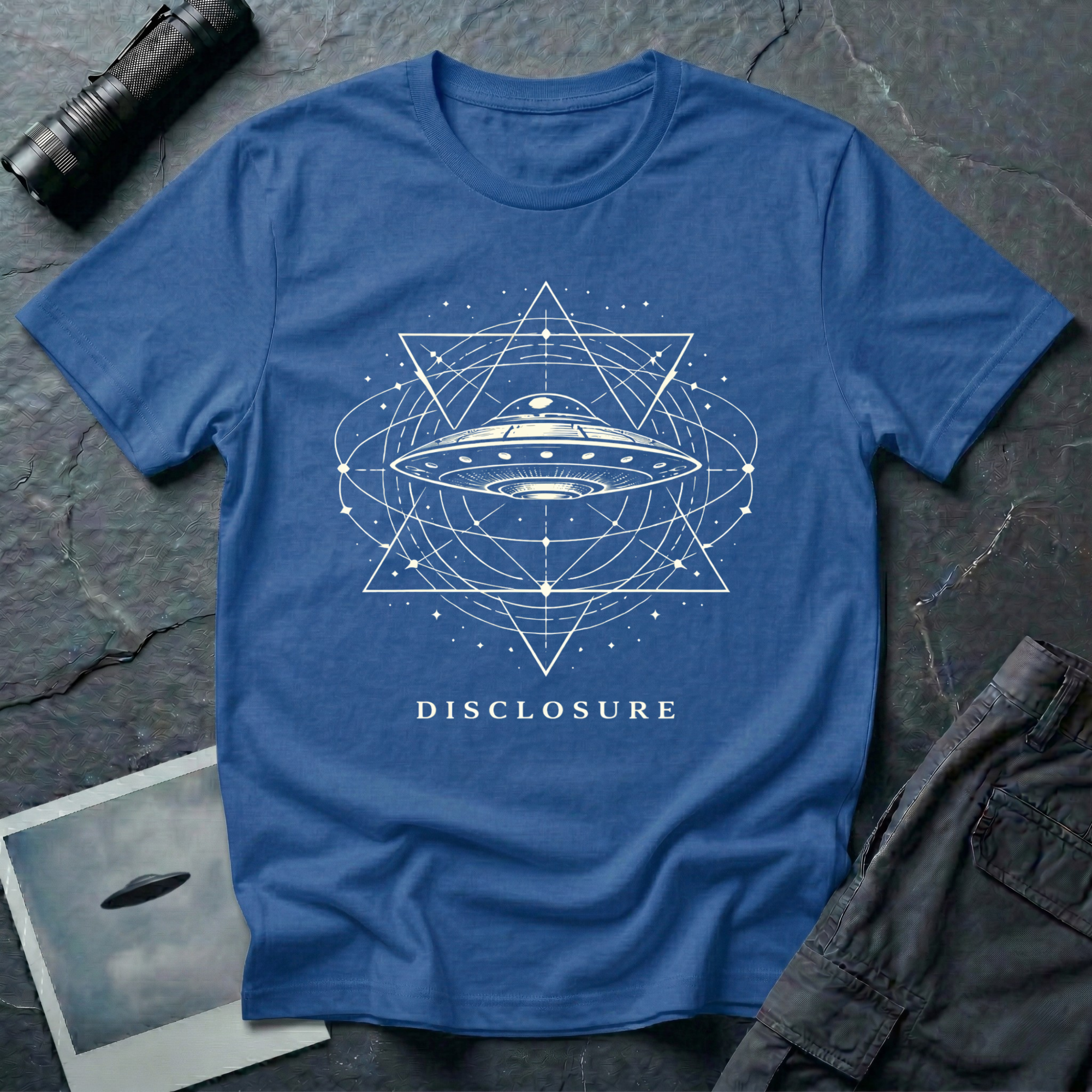 Disclosure UFO t-shirt — classic flying saucer with sacred geometry design on blue unisex cotton tee