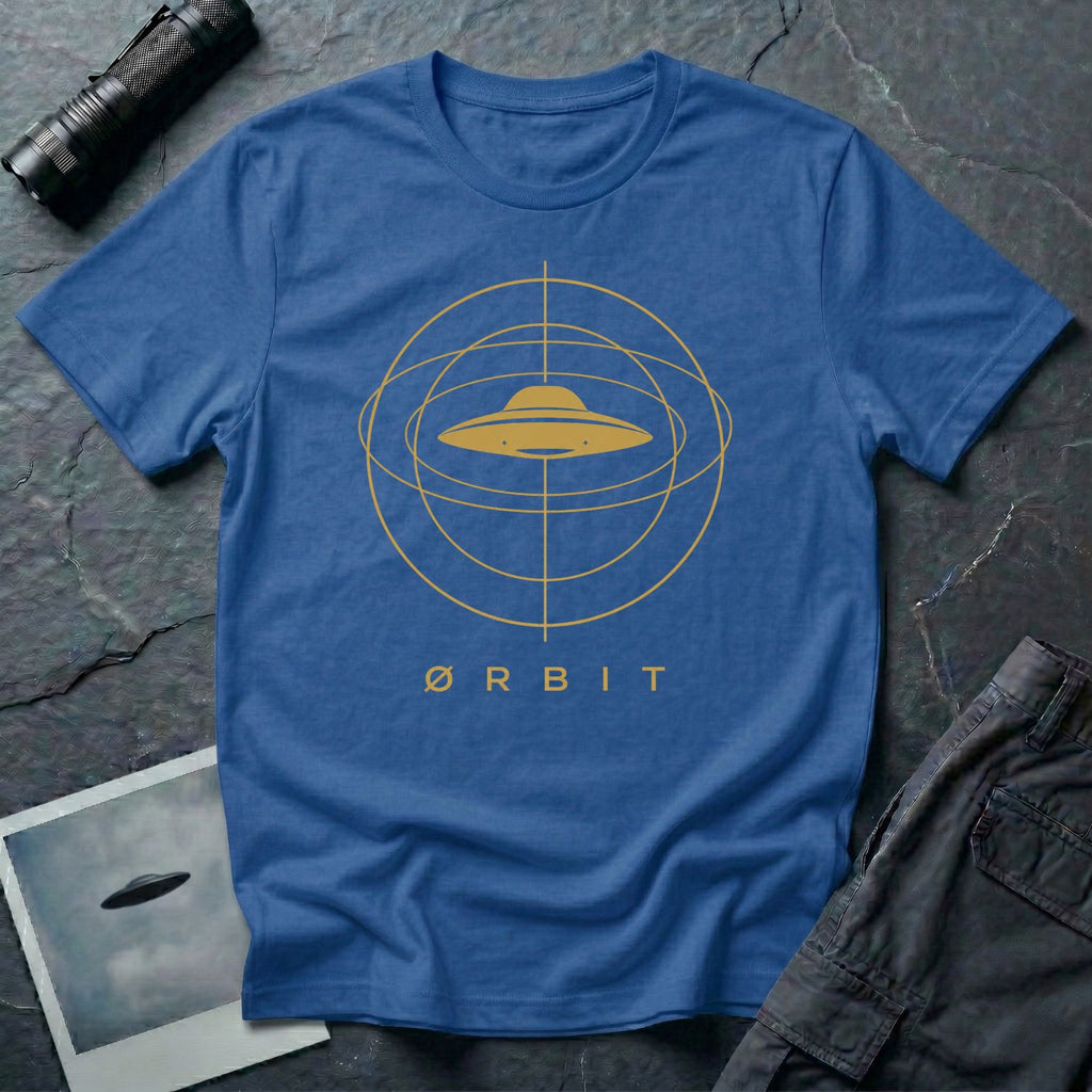 Orbit astronomical UFO t-shirt — flying saucer centred in a gold orbital sphere framework with "Ørbit" sans serif typography on royal blue cotton tee