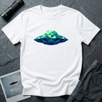 Cubist UFO geometric low poly t-shirt — classic flying saucer rendered in triangular facets of mint green, teal, and navy blue on white cotton tee