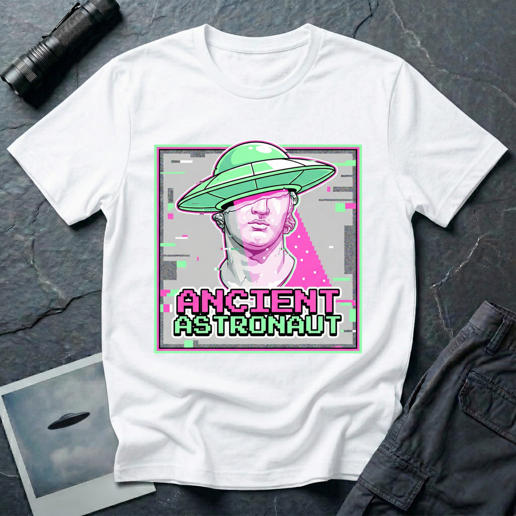 Ancient Astronaut vaporwave UFO t-shirt — classical Greek Roman marble bust statue in pink and purple with bright green flying saucer on head, digital glitch effects, gray distortion bars, and pixelated "ANCIENT ASTRONAUT" text in magenta and green on white cotton tee