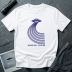Nevada Sky 03:00 AM UFO sighting t-shirt — navy flying saucer with parabolic trail of parallel lines and timestamp caption on white cotton tee