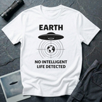No Intelligent Life Detected UFO t-shirt — classic flying saucer above concentric scan rings and crosshairs targeting Earth with "EARTH / NO INTELLIGENT LIFE DETECTED" caption in black on white cotton tee