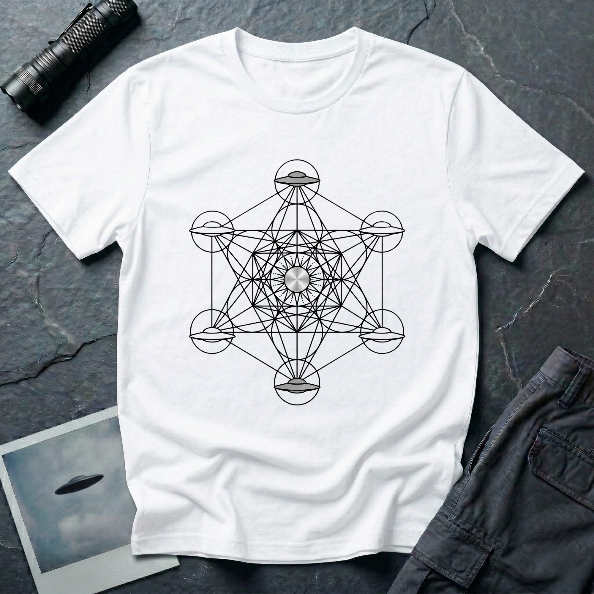 Metatron UFO sacred geometry t-shirt — Metatron's Cube diagram with flying saucers at the eight outer node points and a radiant central disc on white cotton tee