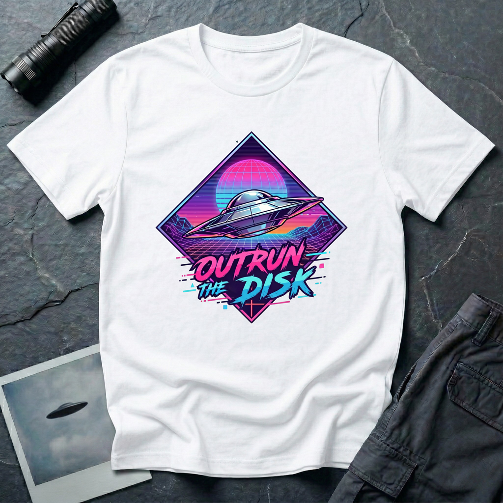 Outrun The Disk synthwave UFO t-shirt — chrome saucer across neon grid landscape with wireframe sun and retrowave typography on white cotton tee