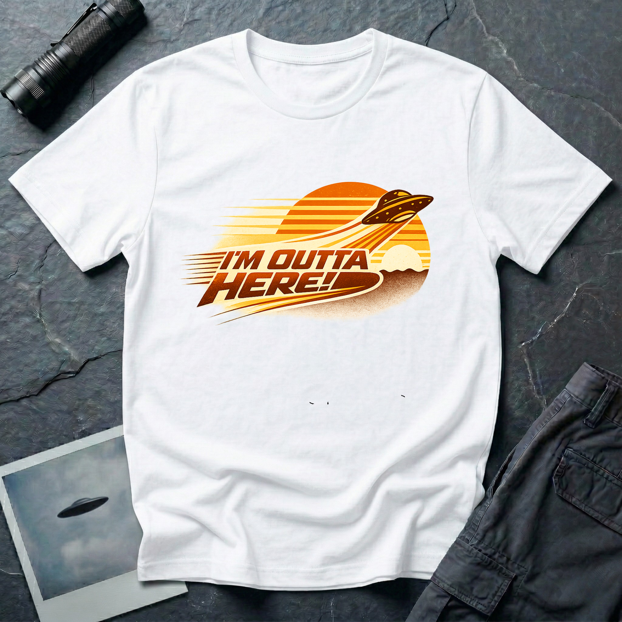 I'm Outta Here retro 80s UFO t-shirt — flying saucer speeding across striped sunset with vintage gradient type on white unisex cotton tee