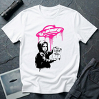 Street art UFO t-shirt with black stencil hooded figure holding "LOST" poster featuring flying saucer icon, bright magenta spray-painted UFO with paint drips hovering above in Banksy graffiti style on white cotton tee