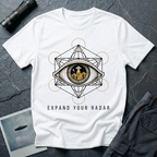 Expand Your Radar all seeing eye UFO t-shirt — sacred geometry frame around an eye containing a desert UFO encounter in gold and black linework on white cotton tee