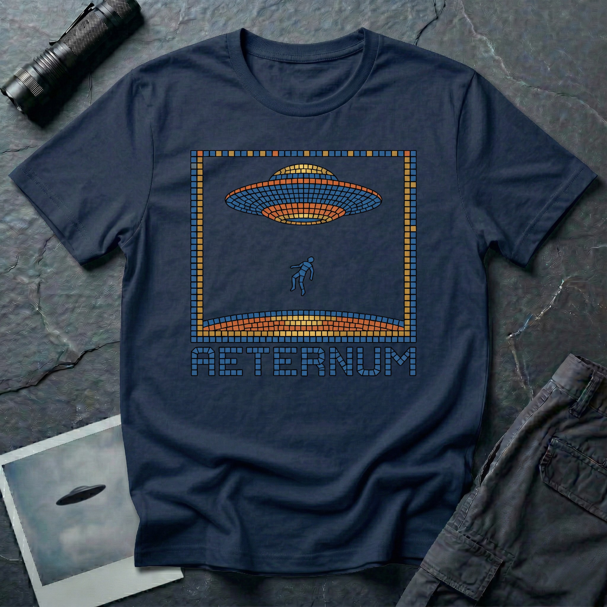 Aeternum Roman mosaic UFO t-shirt — flying saucer and abduction scene in blue and terracotta tile mosaic style on navy cotton tee
