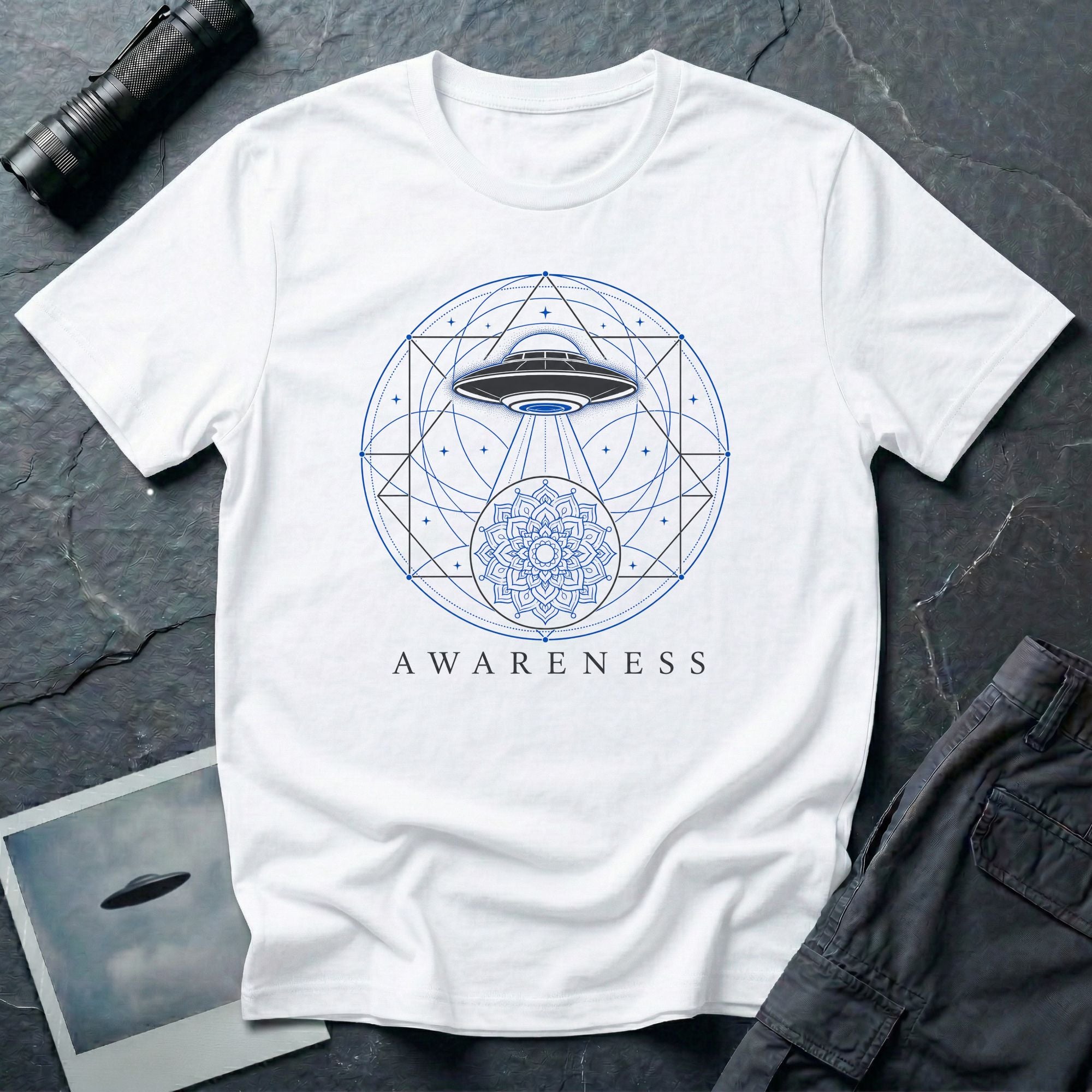 Sacred geometry UFO t-shirt, craft with light beam descending through geometric circles and triangles into a mandala, the word Awareness below, white