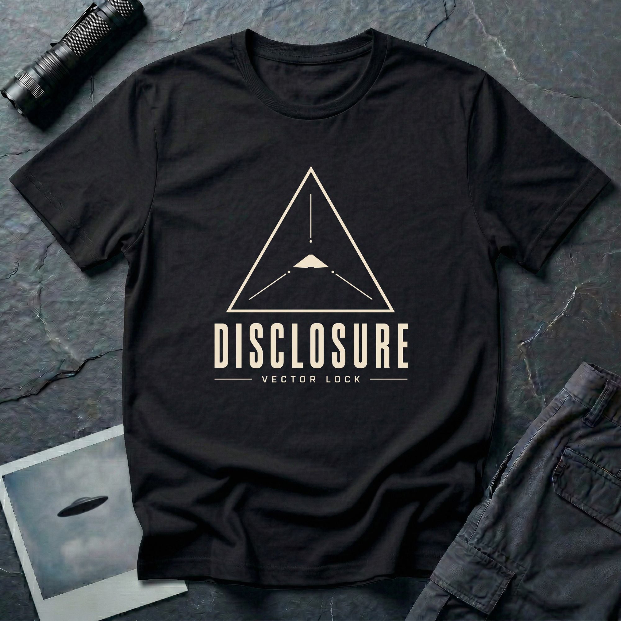 Black UFO disclosure t-shirt with a Black Triangle delta-wing craft inside an upward-pointing targeting triangle with sight lines and the words DISCLOSURE VECTOR LOCK