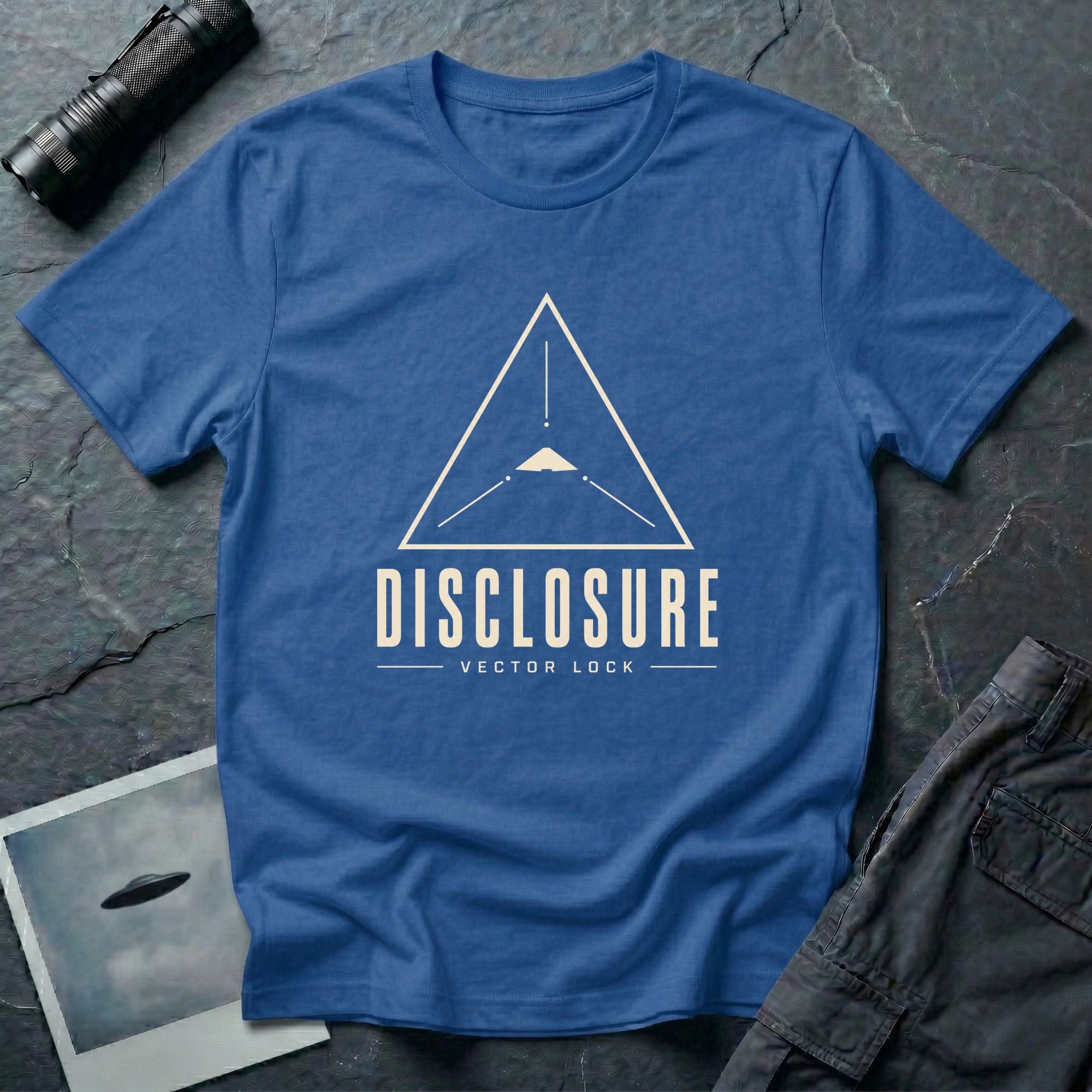 Blue UFO disclosure t-shirt with a Black Triangle delta-wing craft inside an upward-pointing targeting triangle with sight lines and the words DISCLOSURE VECTOR LOCK