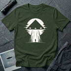 Black triangle UFO green t-shirt with lone figure silhouette and light beam against moon