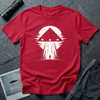 Black triangle UFO red t-shirt with lone figure silhouette and light beam against moon
