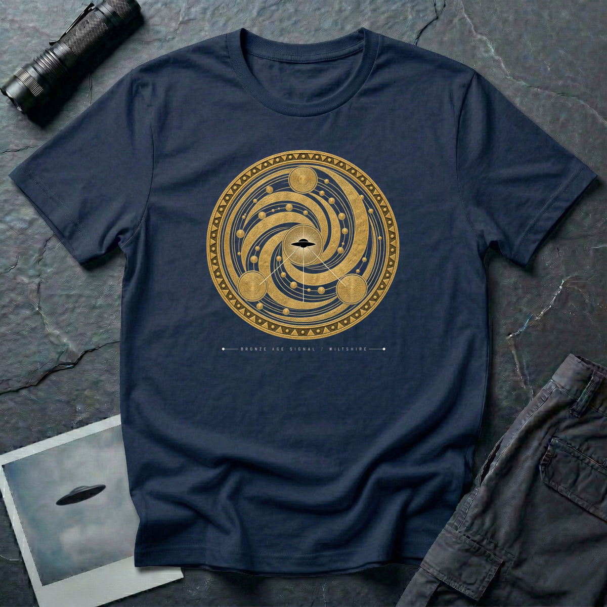 T-shirt with gold concentric sacred geometry circle and UFO at centre and Bronze Age Signal Wiltshire caption, navy blue