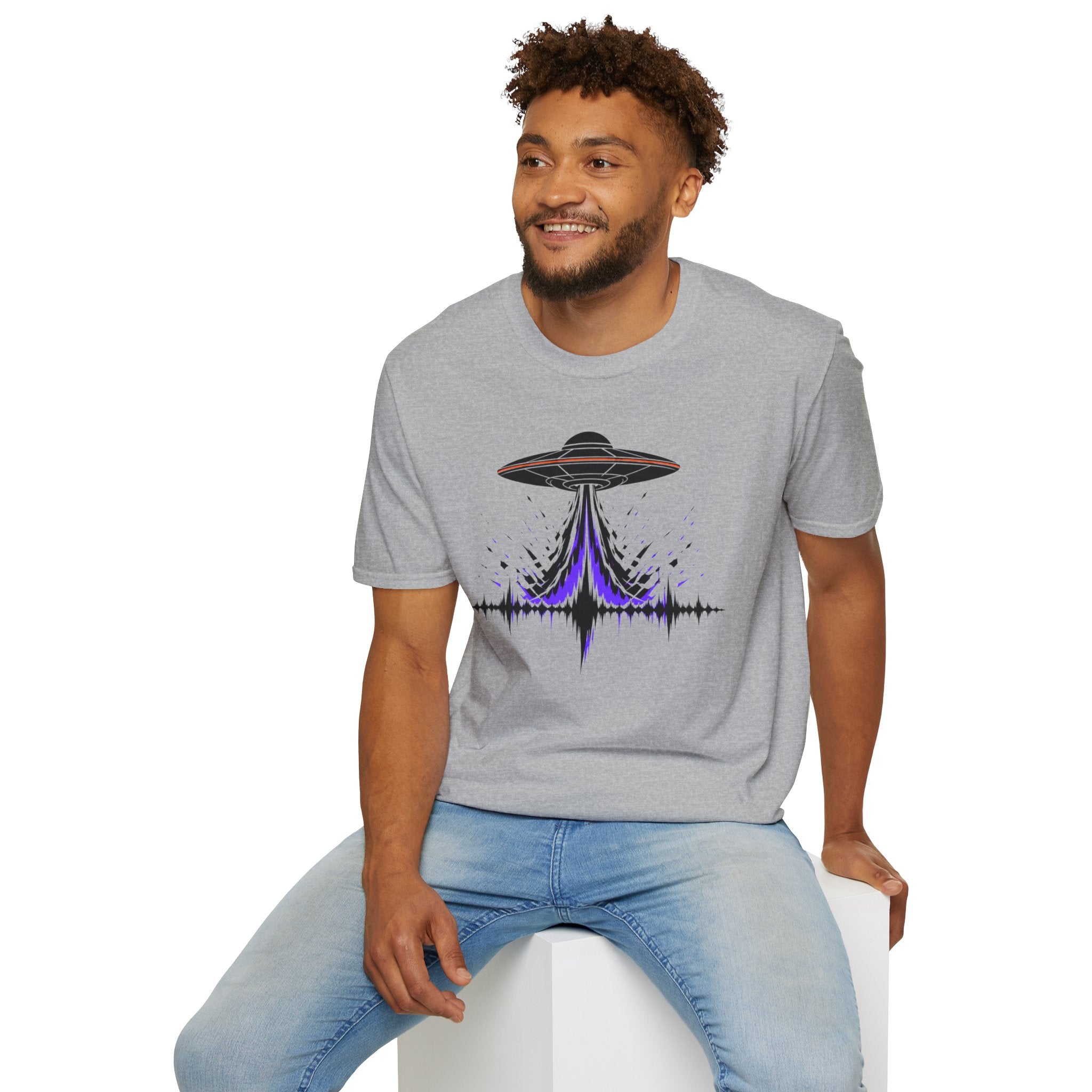 Carrier Wave UFO graphic t-shirt with black saucer emitting a purple and black audio frequency waveform, grey, worn by a model