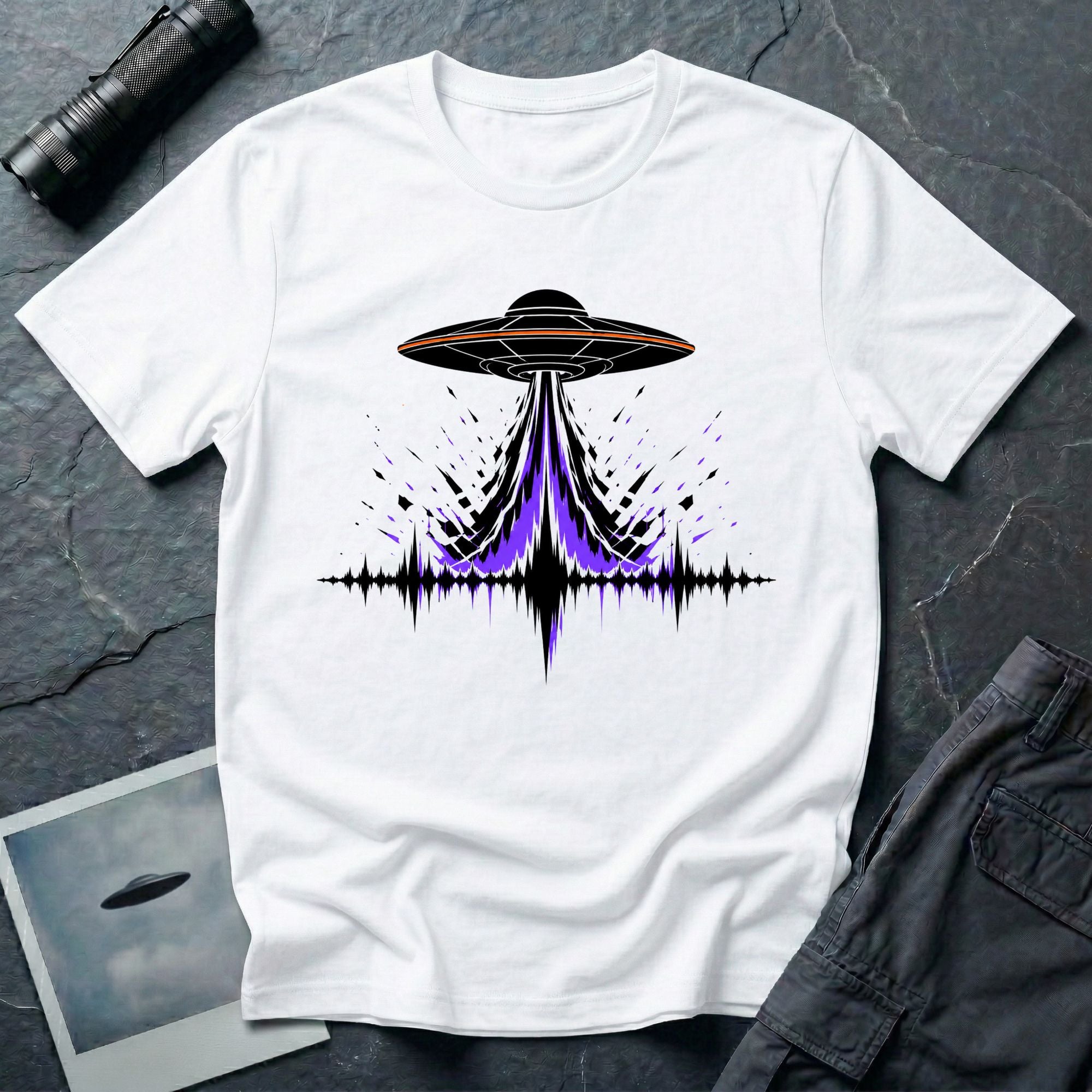Carrier Wave UFO graphic t-shirt with black saucer emitting a purple and black audio frequency waveform, white