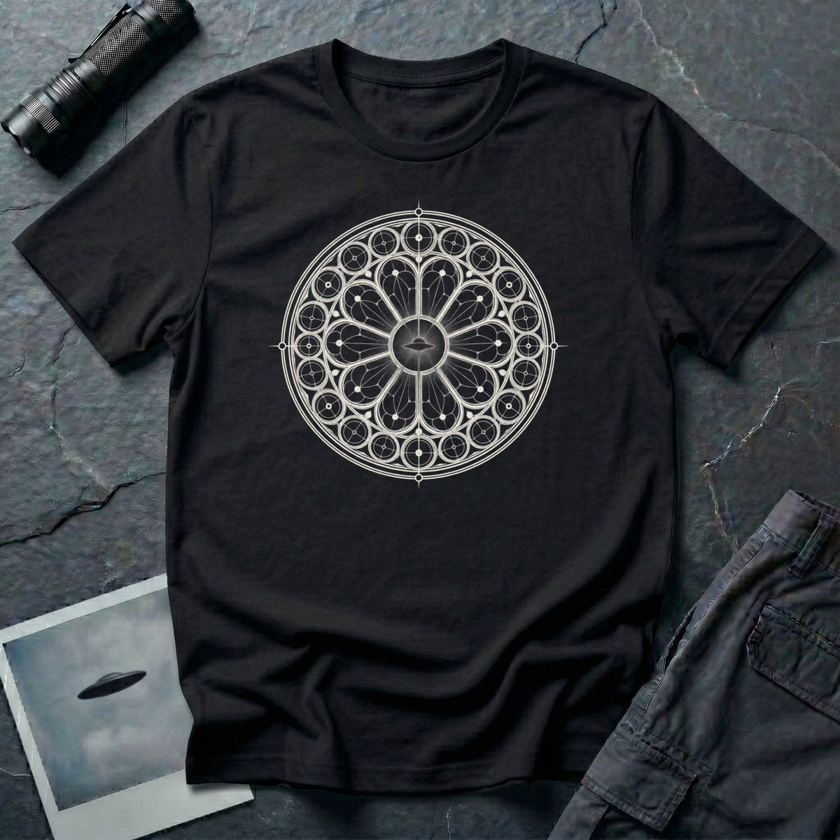 Black t-shirt with white Gothic rose window sacred geometry design and UFO silhouette at the centre
