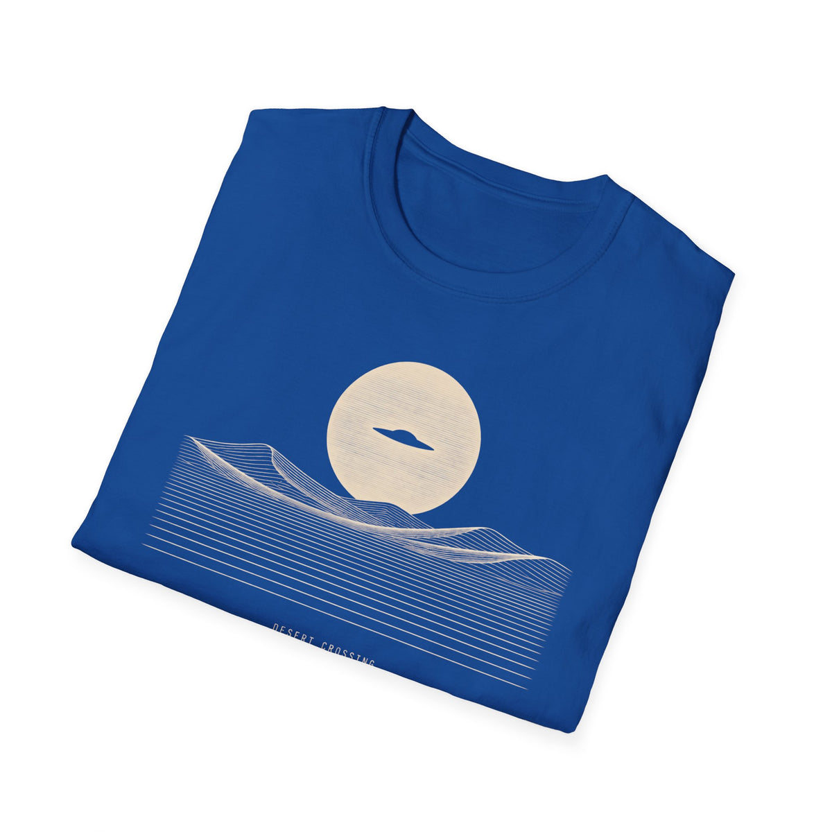 Desert Crossing UFO T-shirt with a black flying saucer crossing a white moon above minimalist line-art desert dunes, royal blue tee