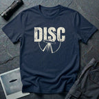Navy blue vintage UFO t-shirt with distressed block letters spelling DISC above a flying saucer with tractor beam in white