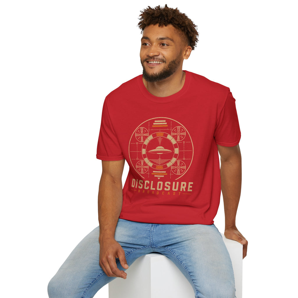 Man wearing red UFO disclosure t-shirt with a flying saucer inside a circular vintage broadcast radar array with orange accents and the words DISCLOSURE BROADCAST