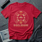 Red UFO disclosure t-shirt with a flying saucer inside a circular vintage broadcast radar array with orange accents and the words DISCLOSURE BROADCAST