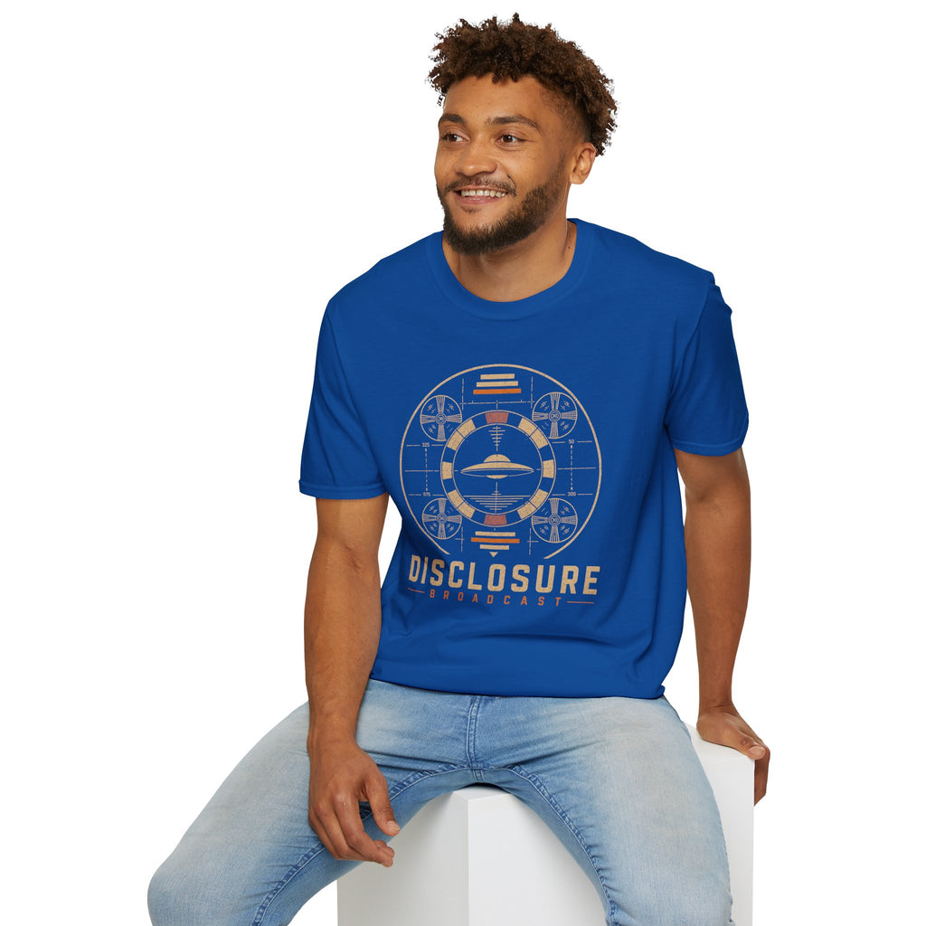 Man wearing blue UFO disclosure t-shirt with a flying saucer inside a circular vintage broadcast radar array with orange accents and the words DISCLOSURE BROADCAST