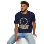 Man wearing navy blue UFO disclosure t-shirt with a flying saucer silhouetted inside a total solar eclipse with radiant corona and the word DISCLOSURE in distressed block letters