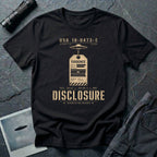 Black UFO disclosure t-shirt with a classified evidence tag hanging from a flying saucer showing TOP SECRET SCI EYES ONLY and the word DISCLOSURE in distressed stencil type