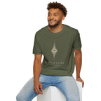 Man wearing green UFO disclosure t-shirt with a flying saucer at the centre of a diamond-shaped frequency waveform in white with the words DISCLOSURE FREQUENCY beneath